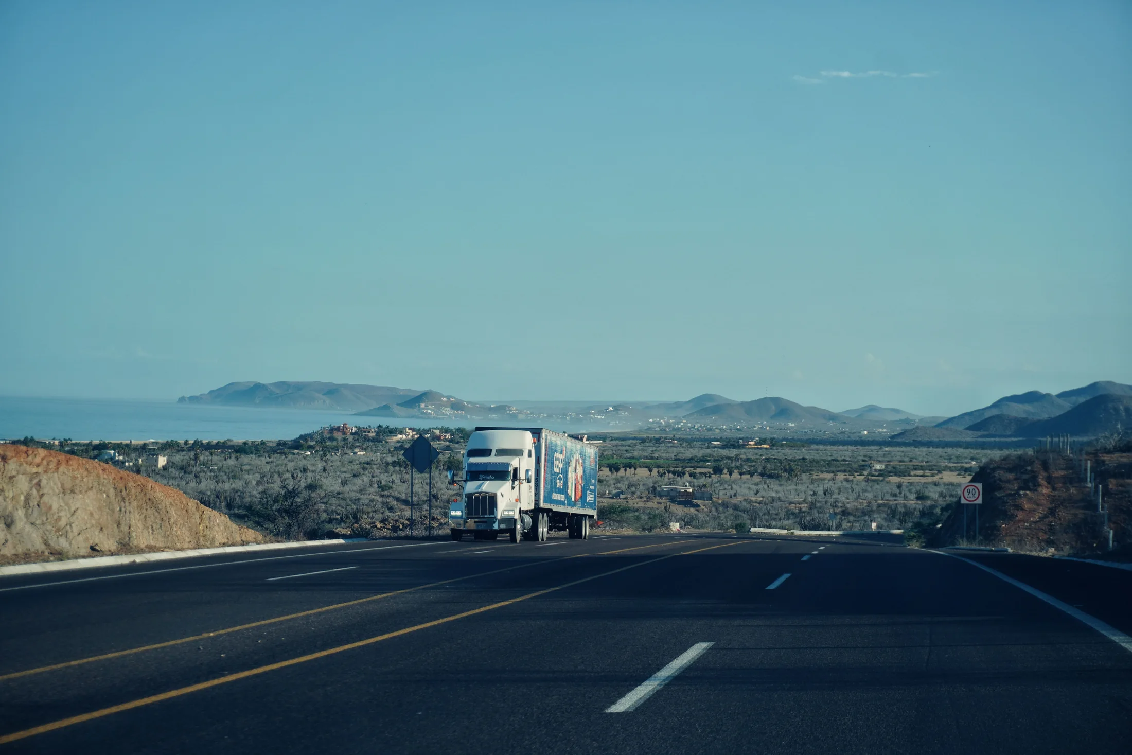 Semi-truck traveling on a roadway